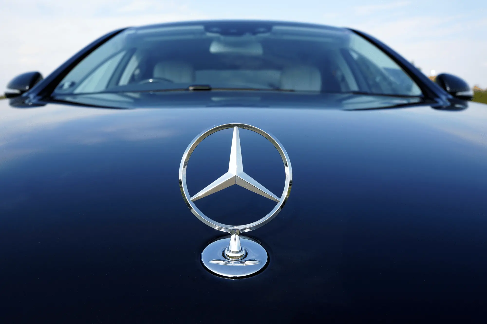 Mercedes S-Class outside a modern office building in Amsterdam's business district